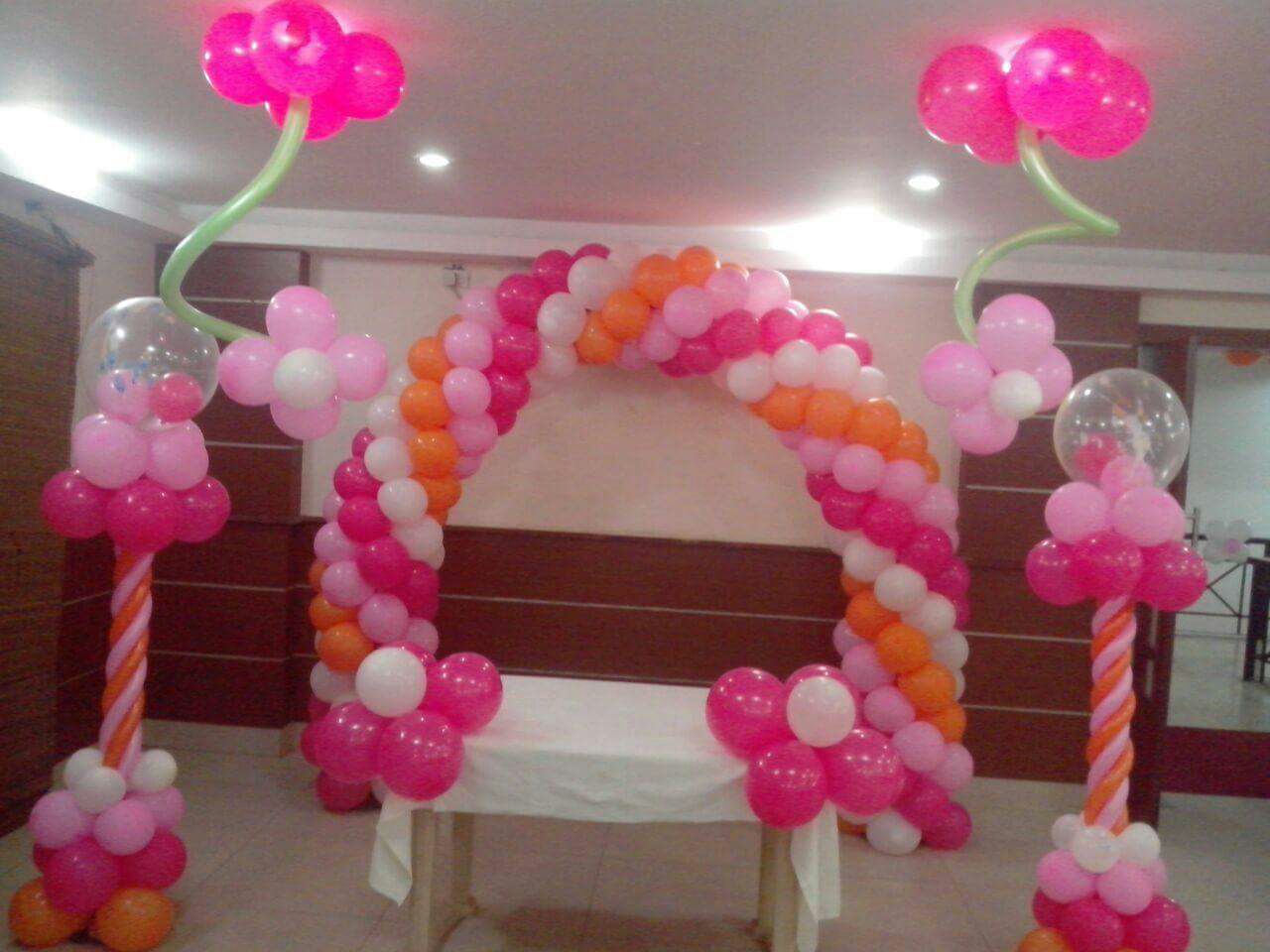 Pink and white balloon decorators Bangalore