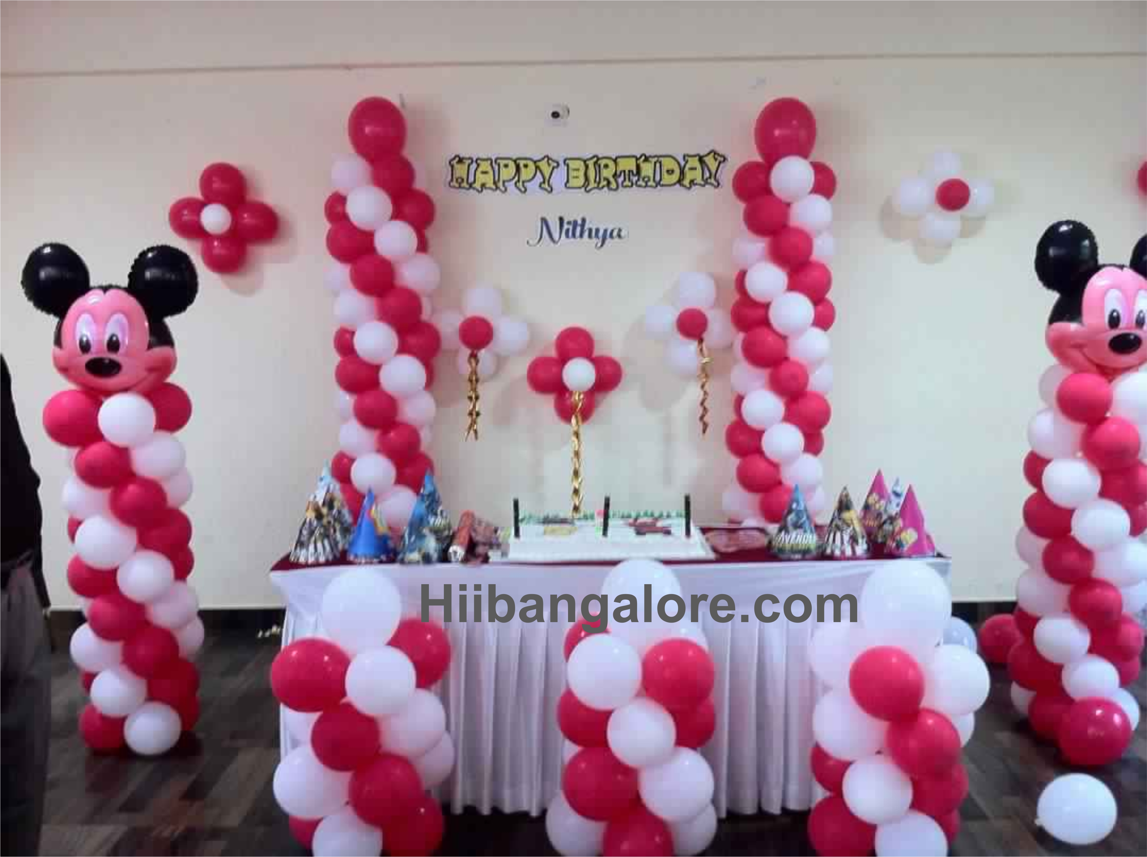 Red and white mickey mouse balloon decorators Bangalore