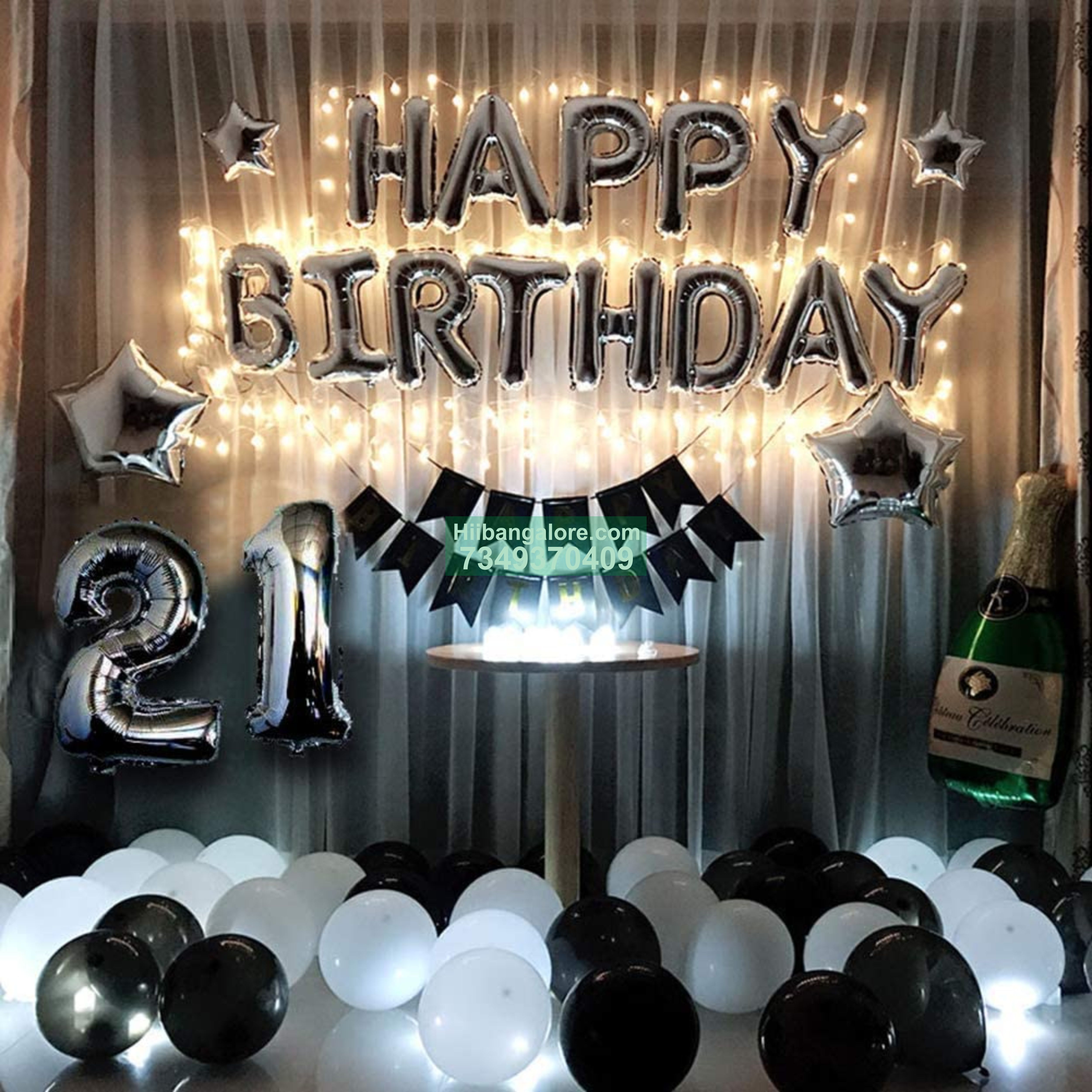 Black and white birthday balloon decoration for home Bangalore