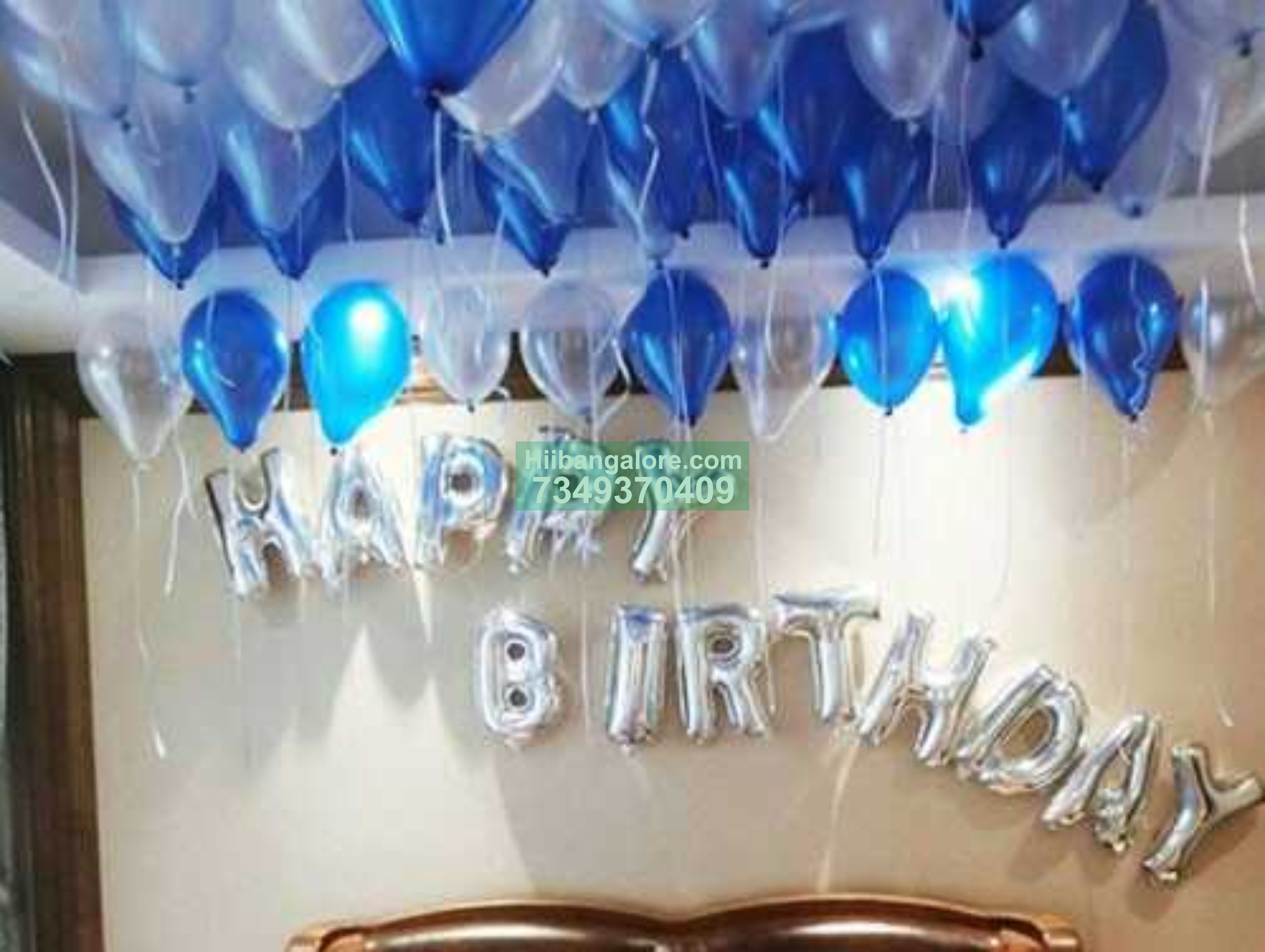 Blue and white home balloon decoration bangalore