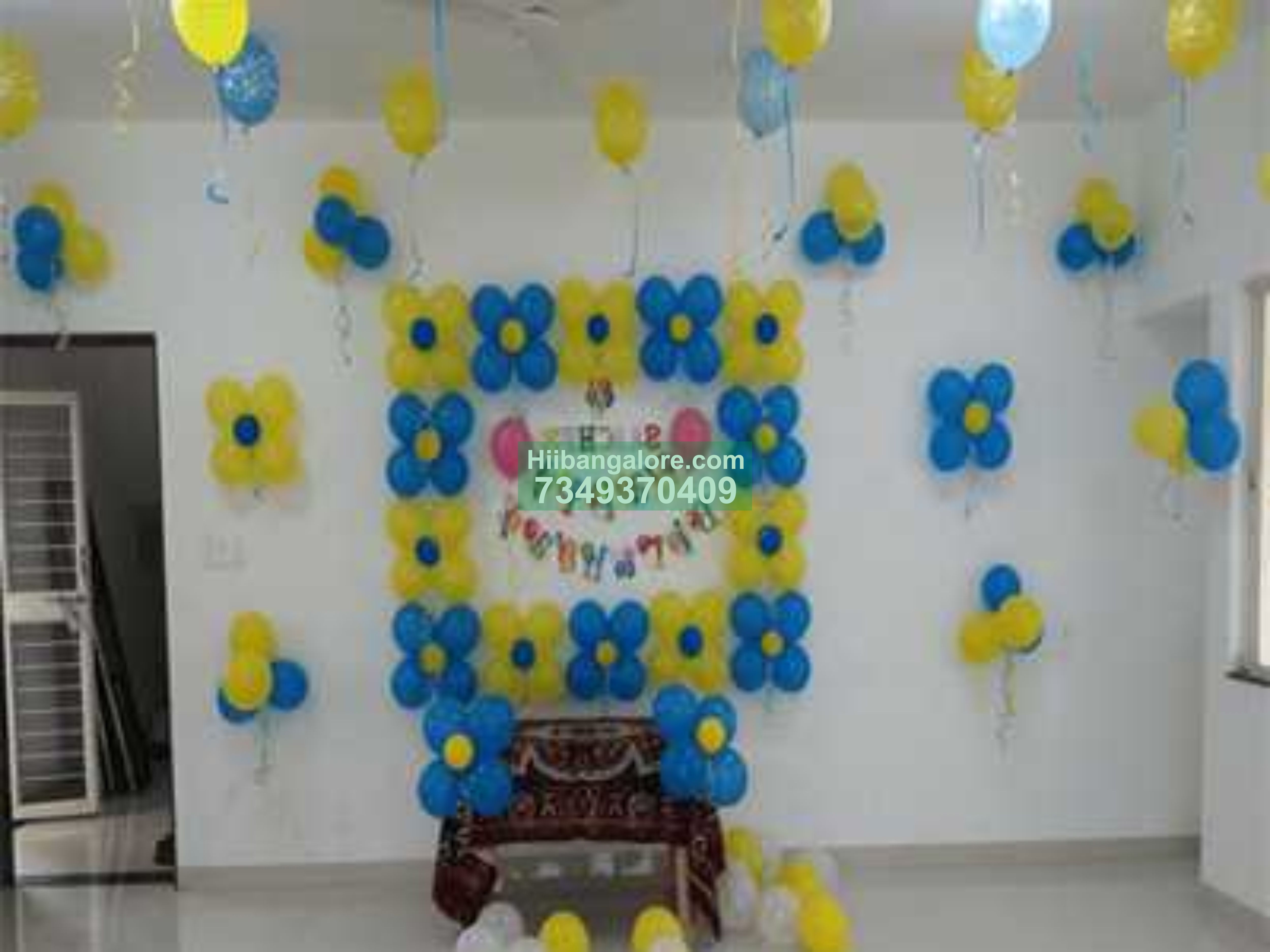 Blue and yellow balloon decoration at home Bangalore