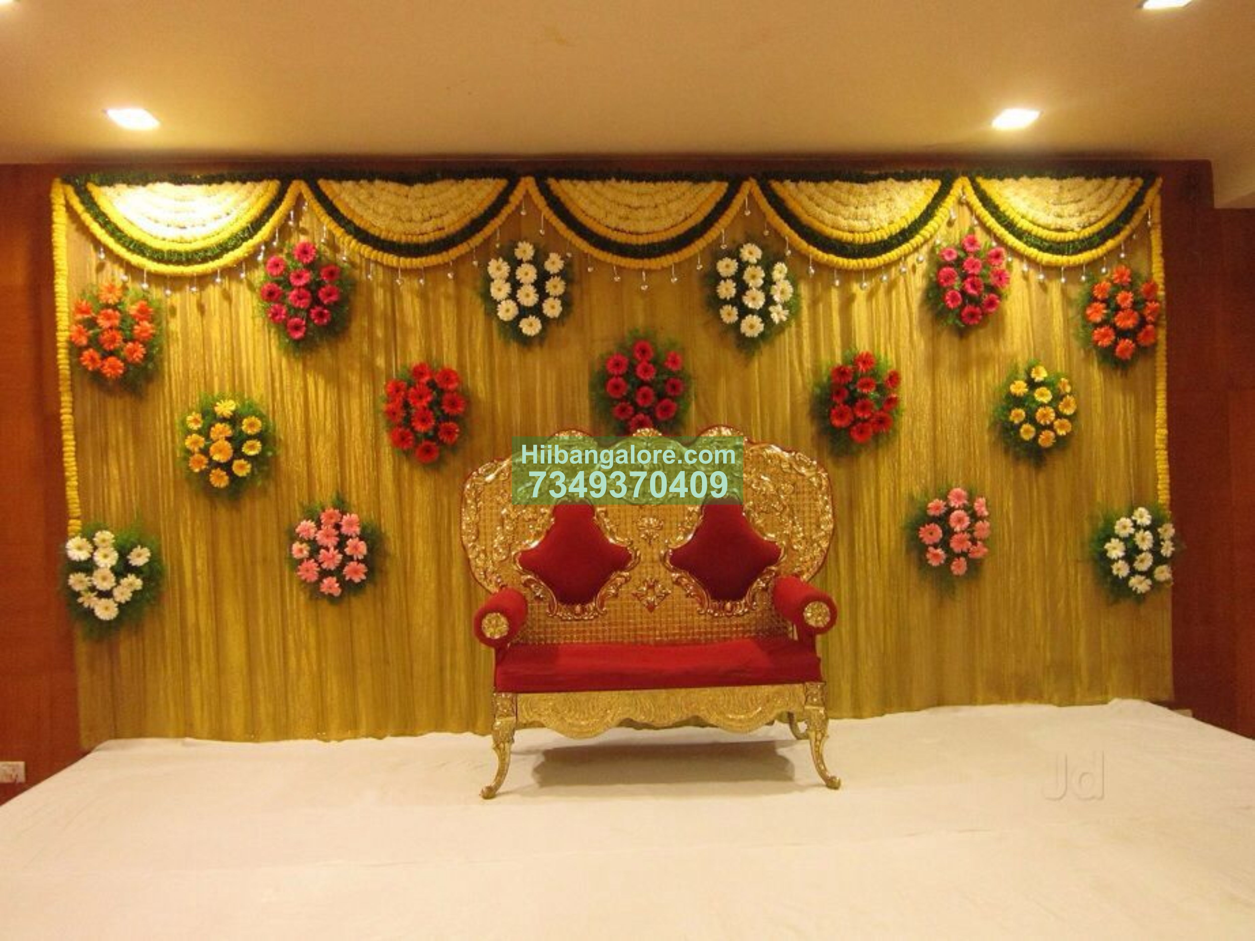 Marigold and jerbera flower decoration for engagement Bangalore