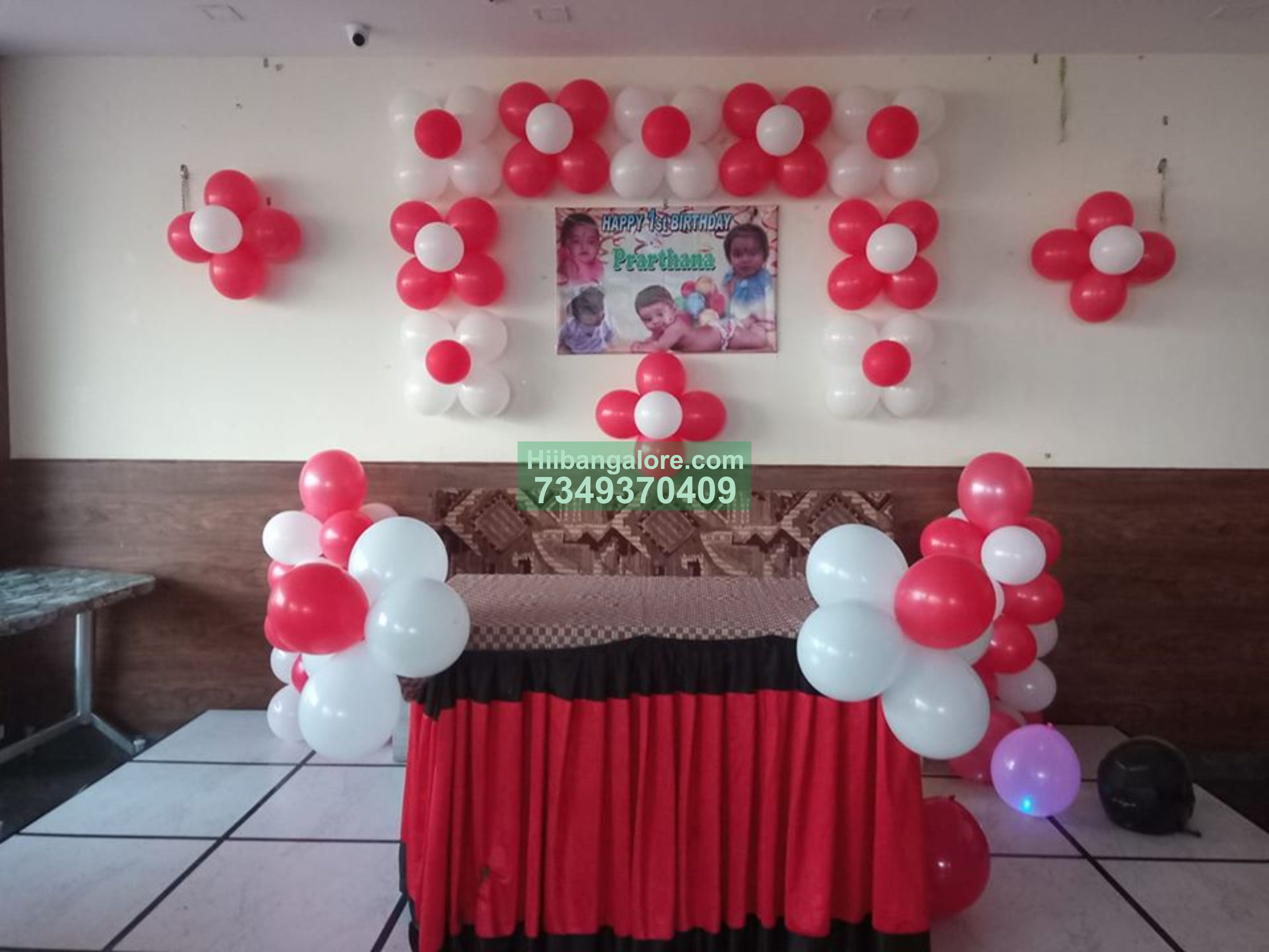 Red and white balloon decoration at home with name board Bangalore