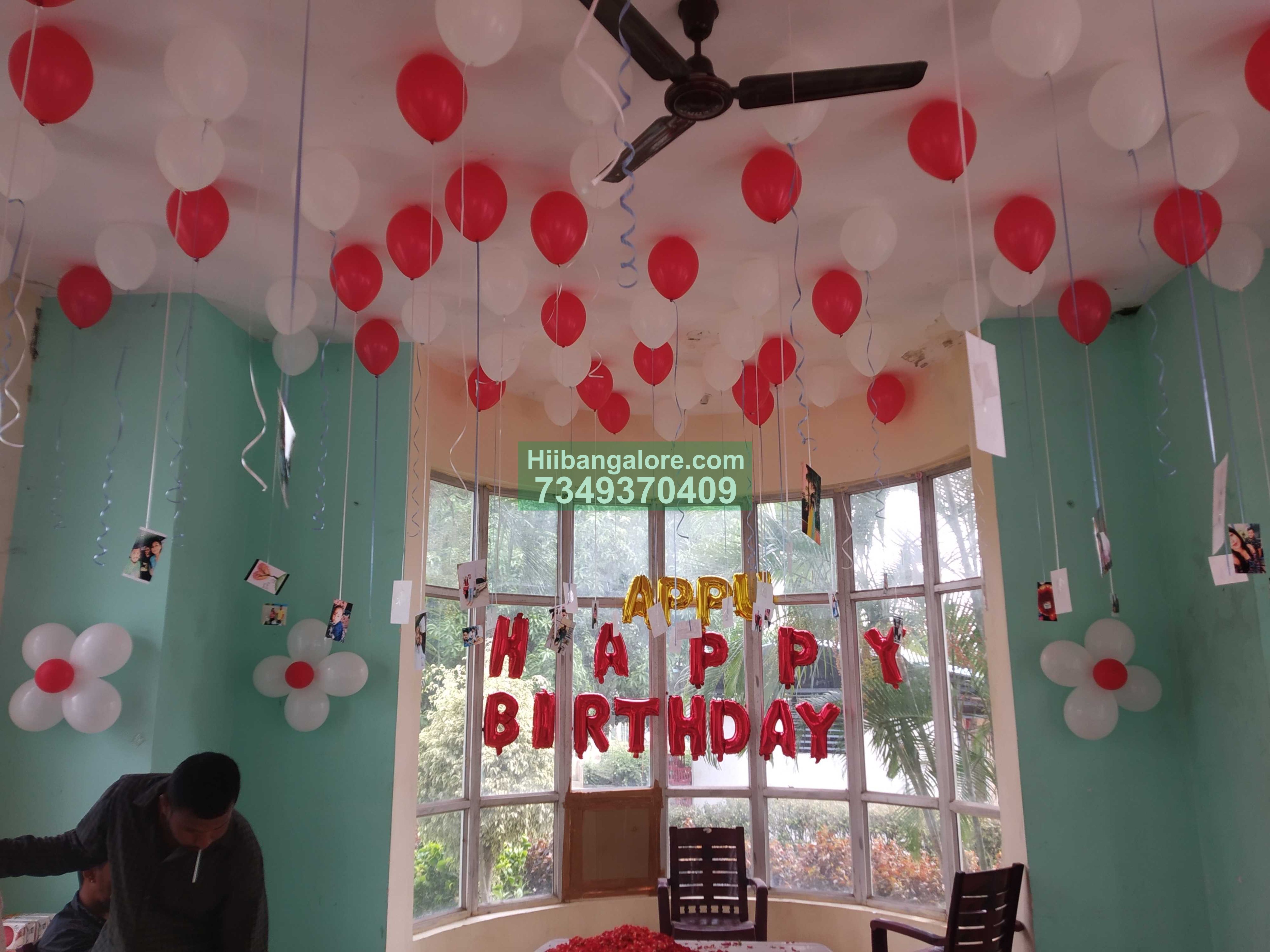 Red and white home balloon decoration bangalore