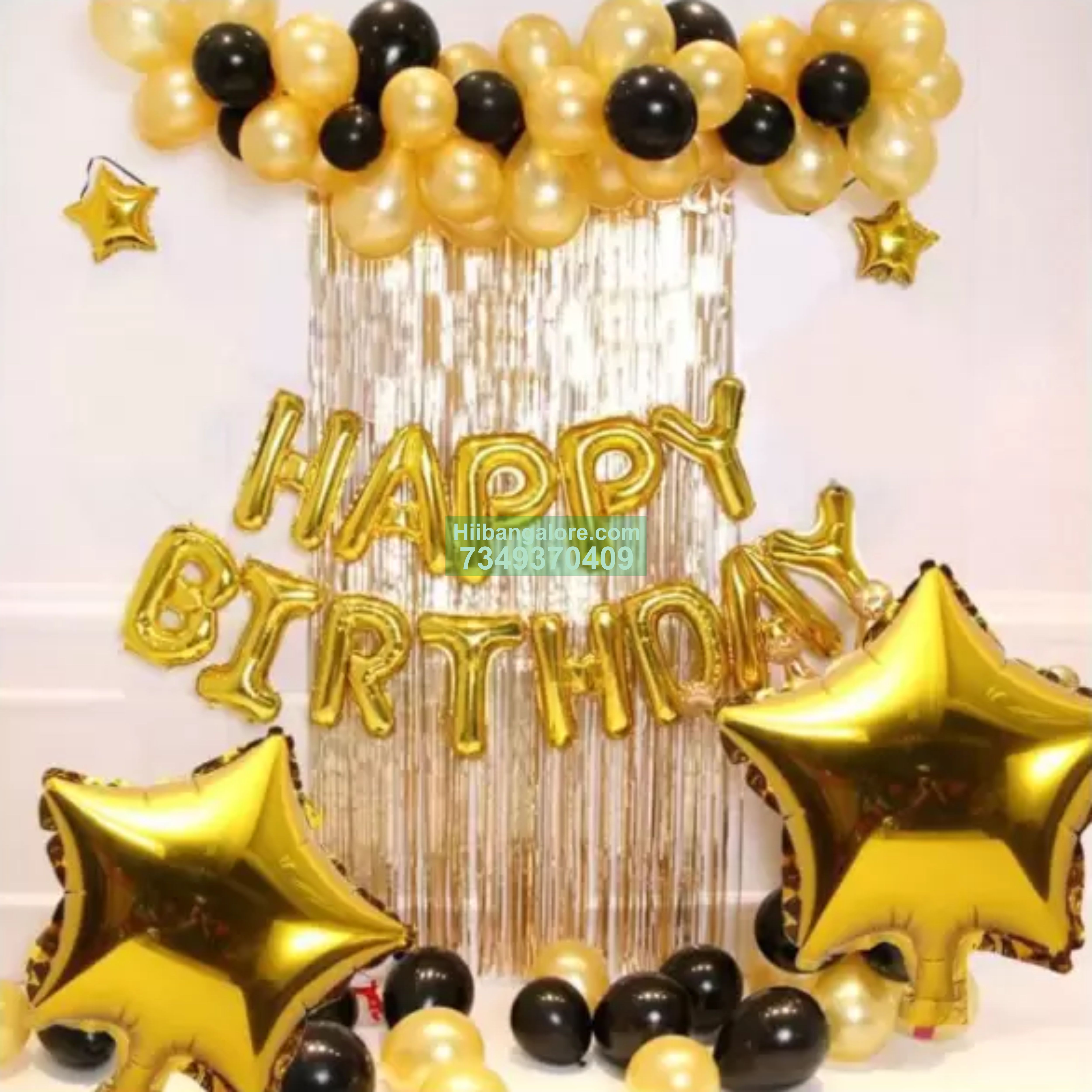 Simple gold and black balloon decor at home Bangalore