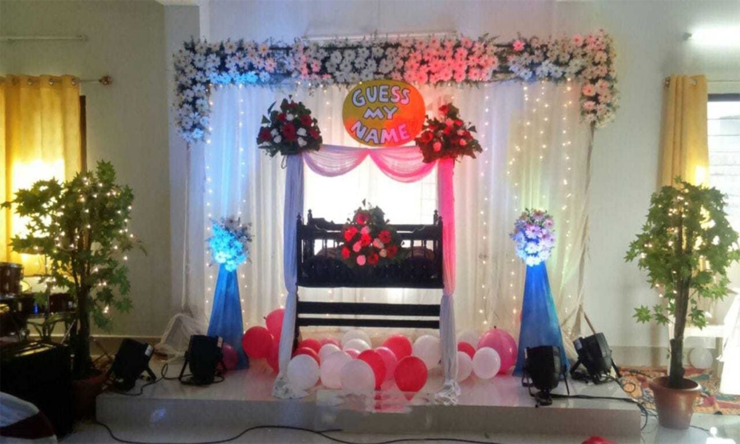 Naming ceremony flower decoration with cradle setup