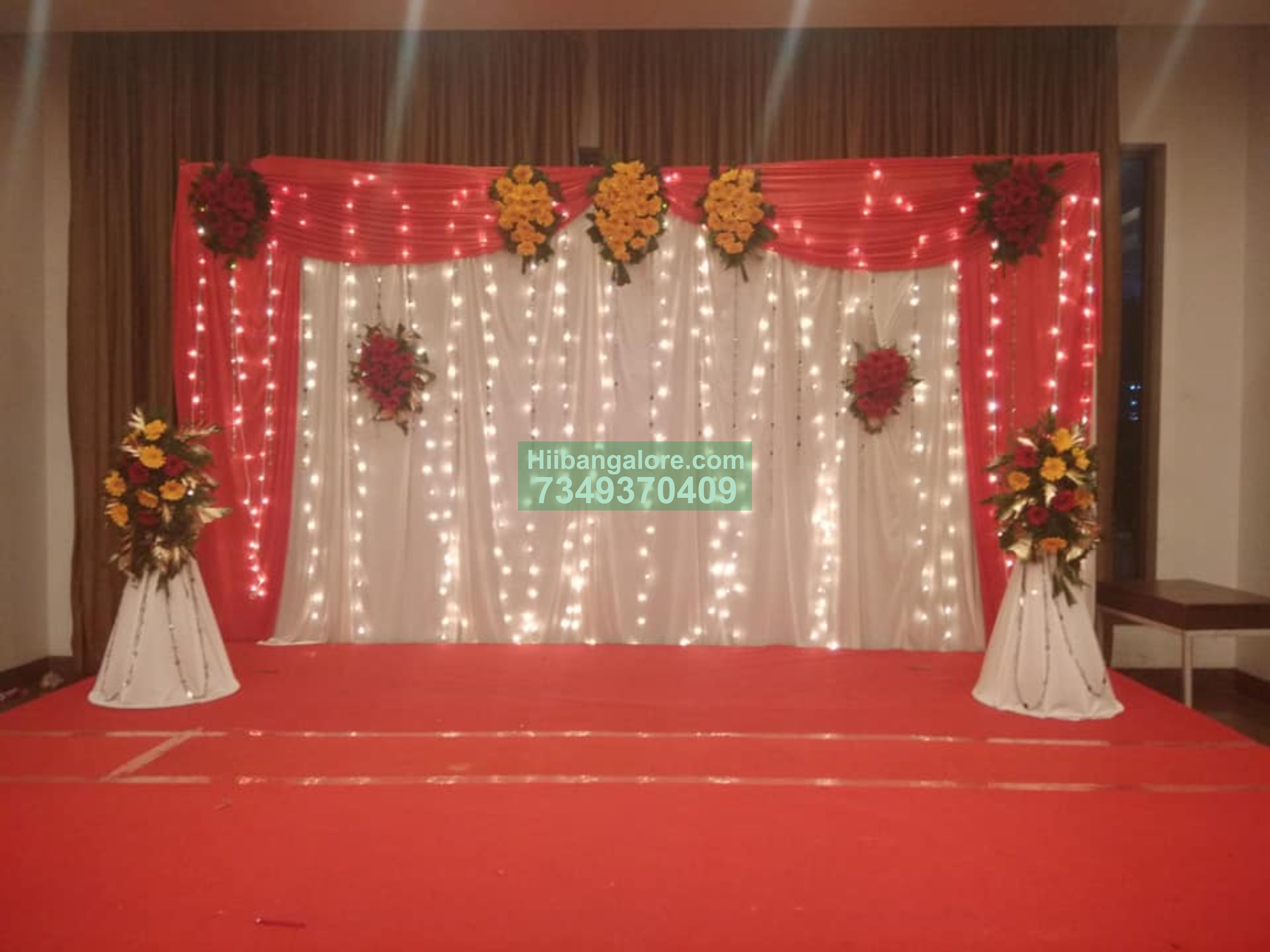 Simple red and white engagement flower decoration Bangalore Bangalore