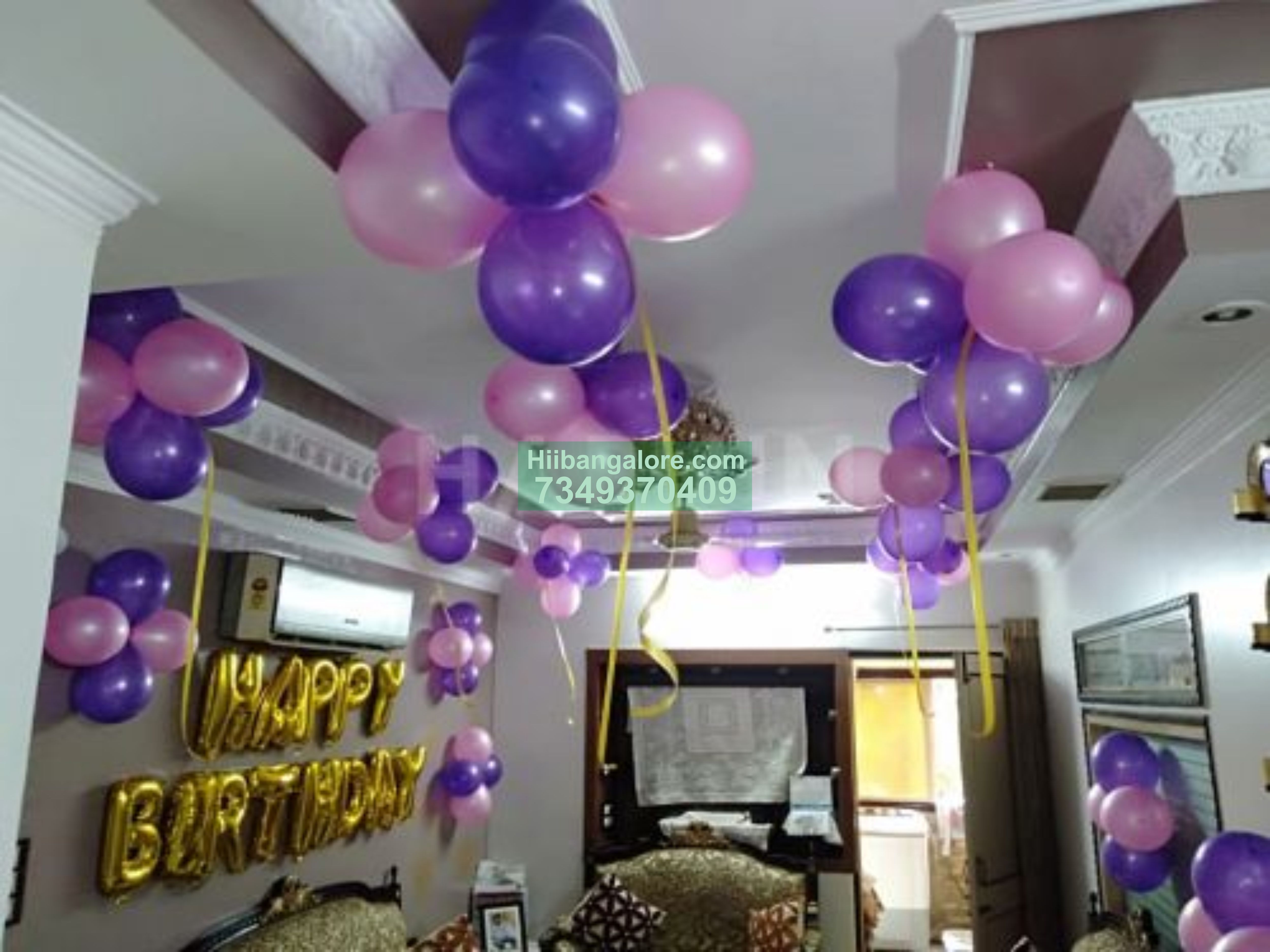 pink and purple with foil balloon decor at home Bangalore