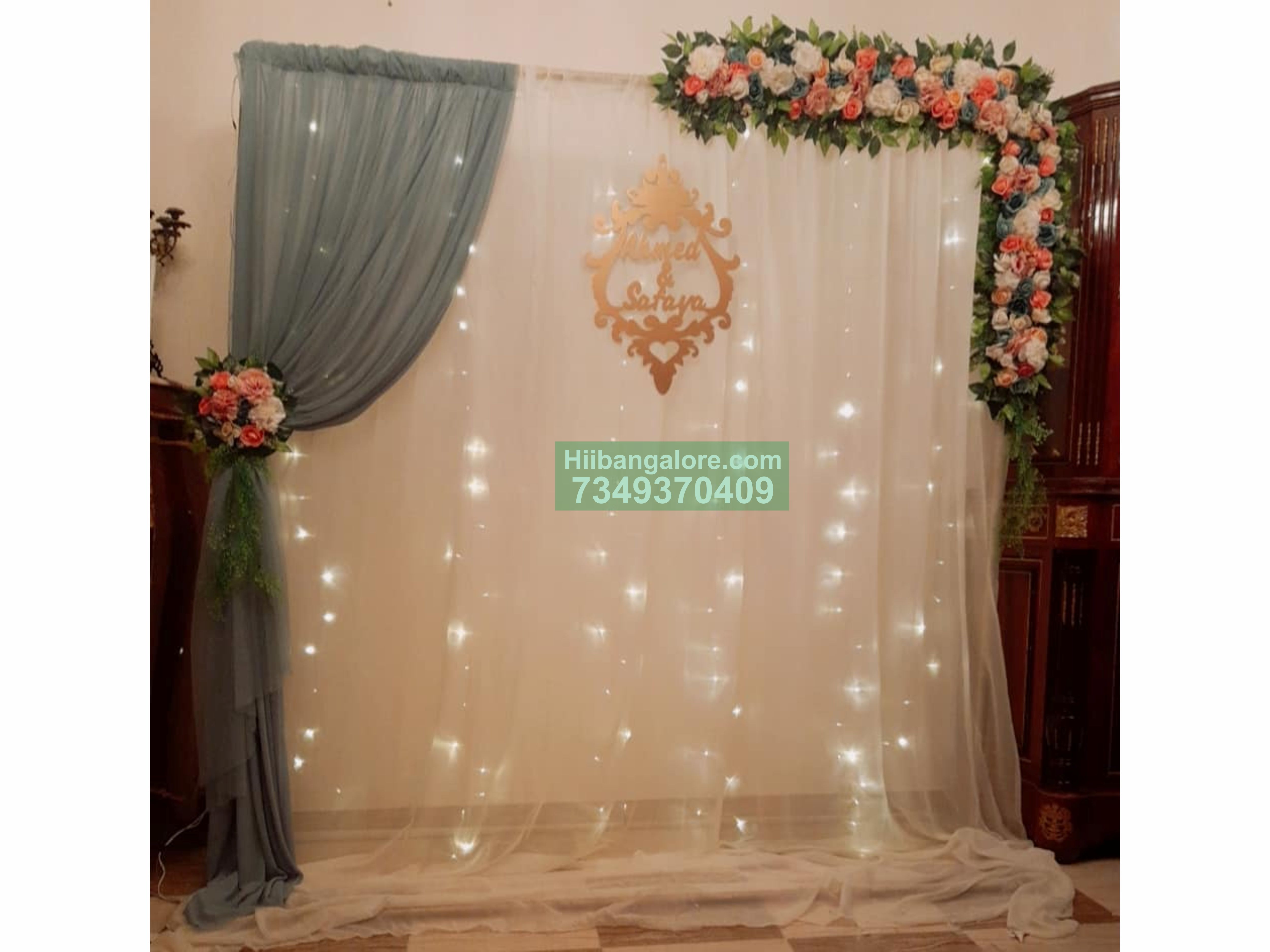 simple flower decor with white backdrop for engagement Bangalore