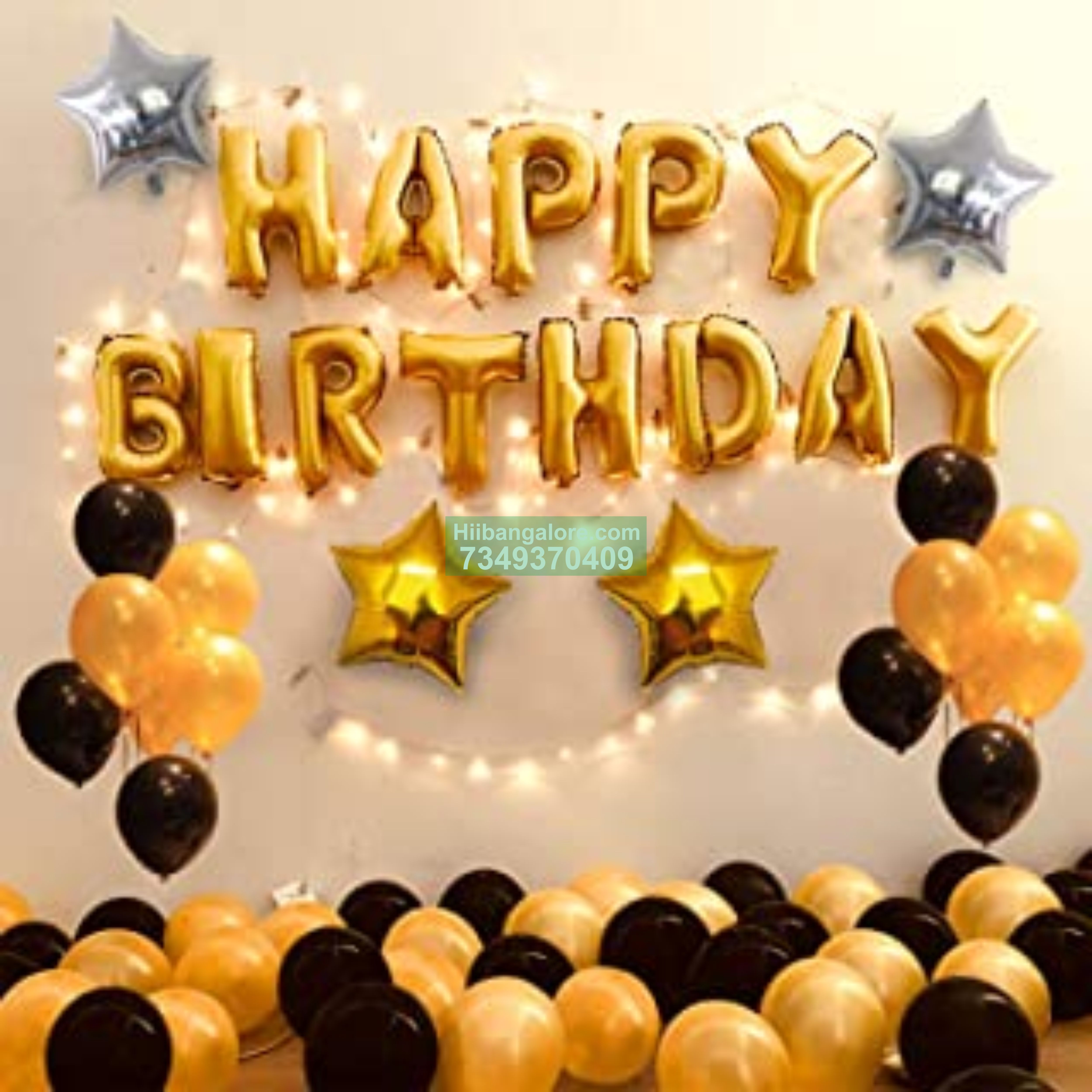 simple gold and black birthday decor at home Bangalore