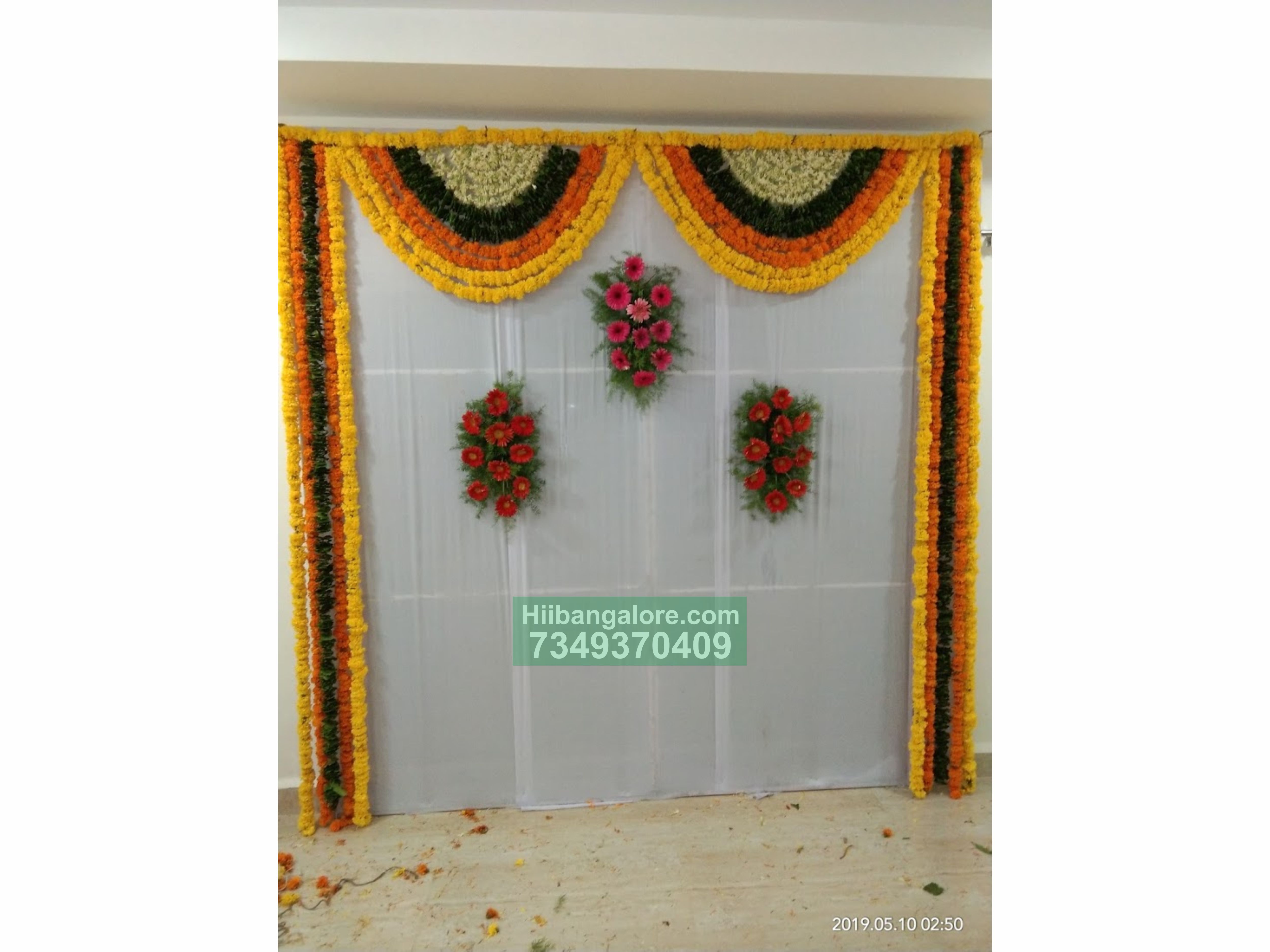 simple marigold engagement flower decoration Bangalore