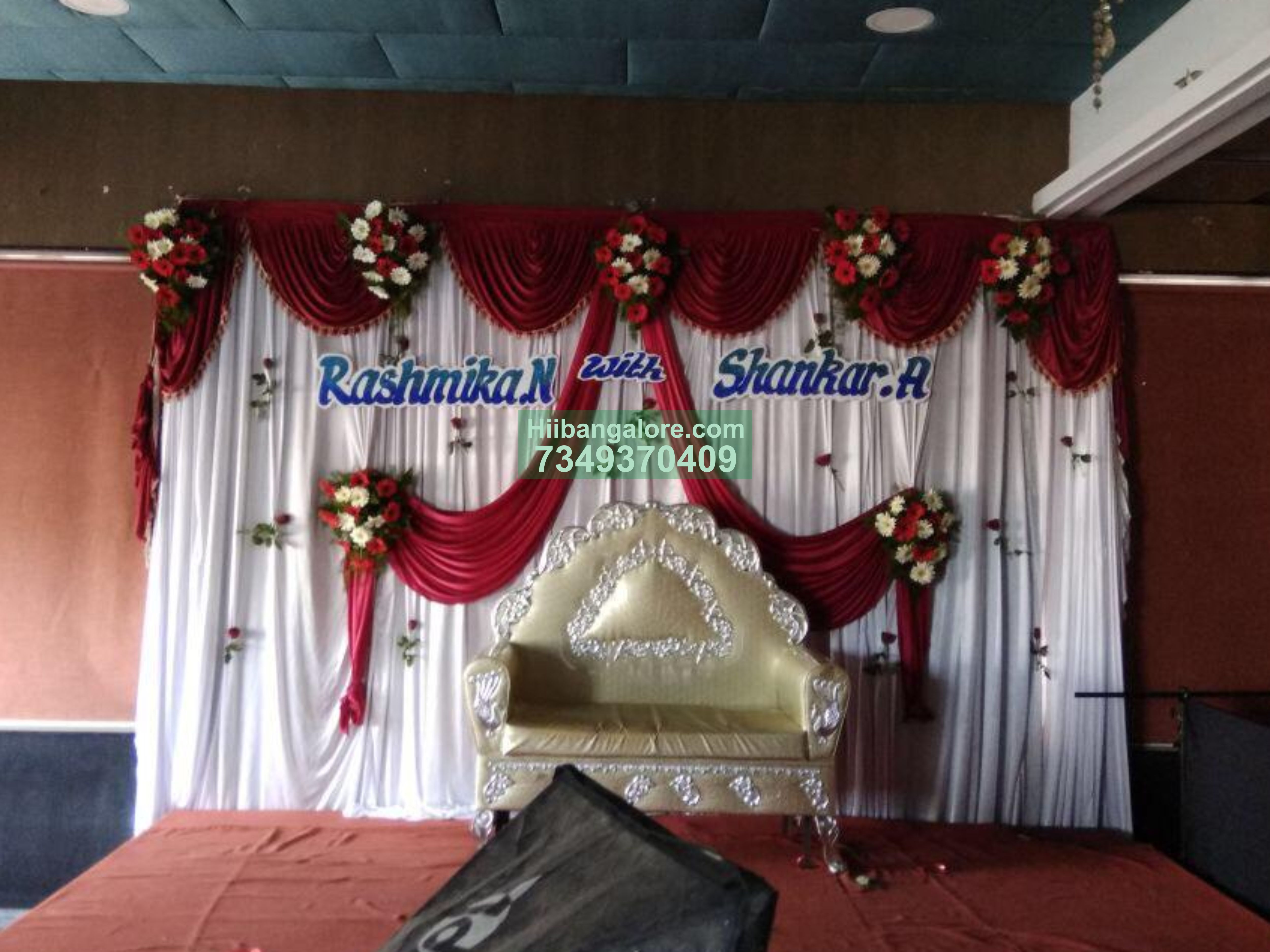 simple maroon and white flower decoration for engagement function Bangalore