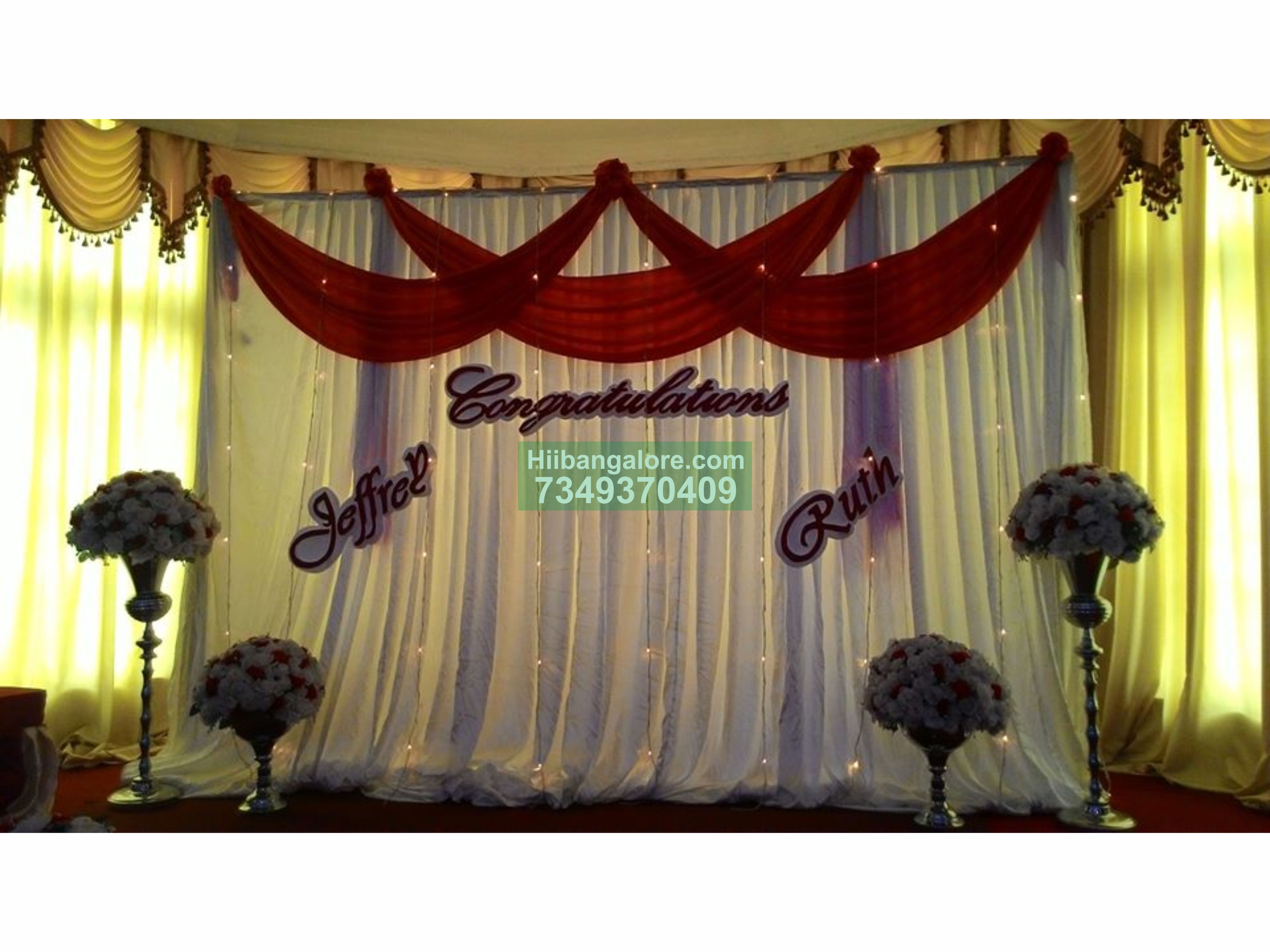 simple red drapes with flower wase decoration for engagement Bangalore