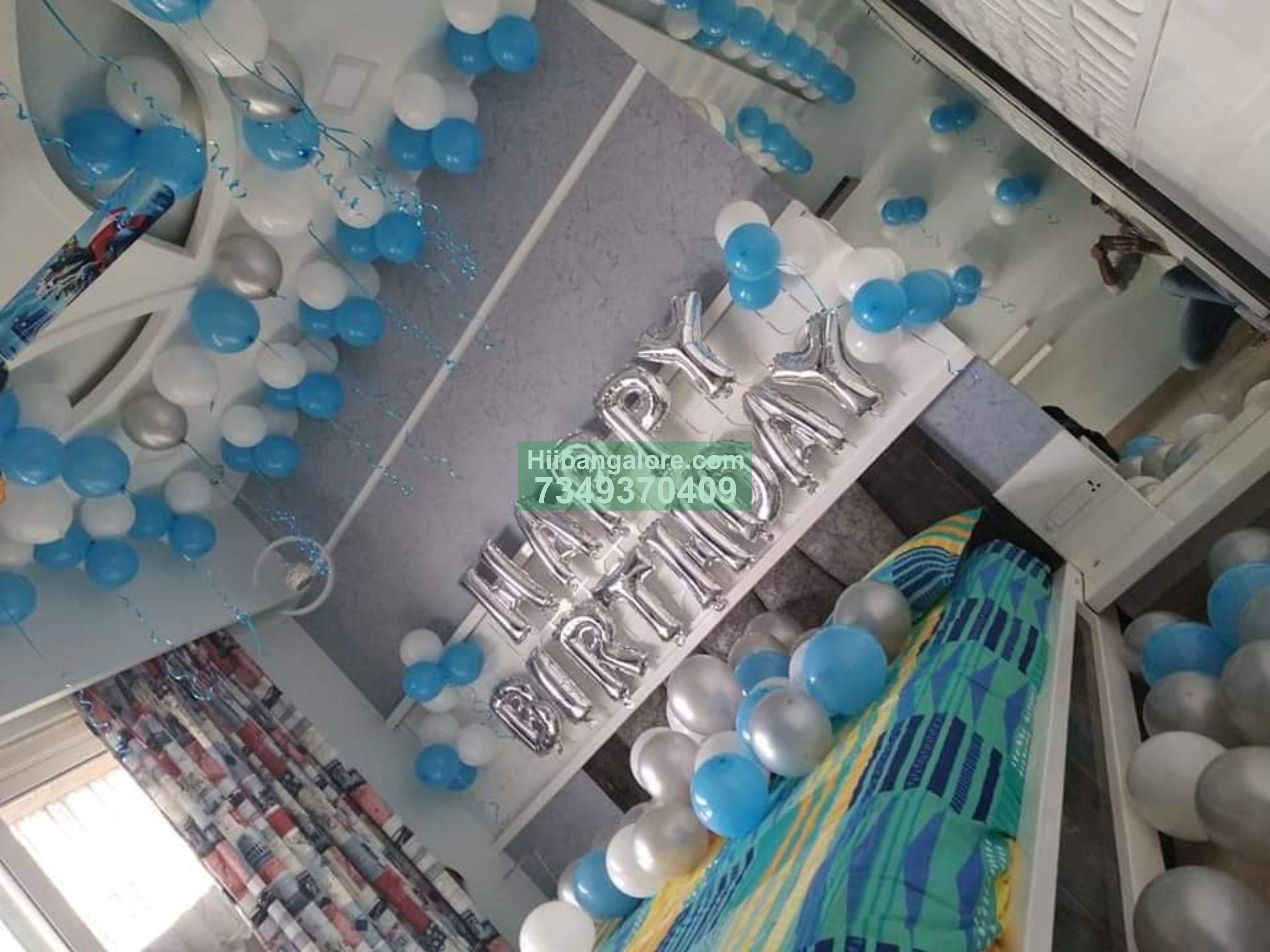 sky blue and white color balloon decoration at home Bangalore