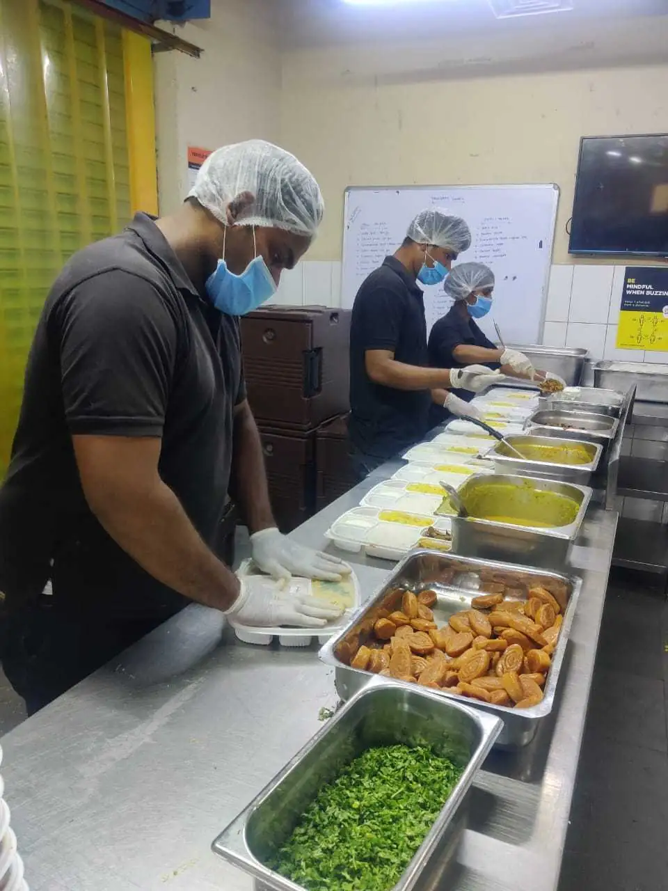 Experienced chefs preparing food for Andhra style catering services in Bangalore