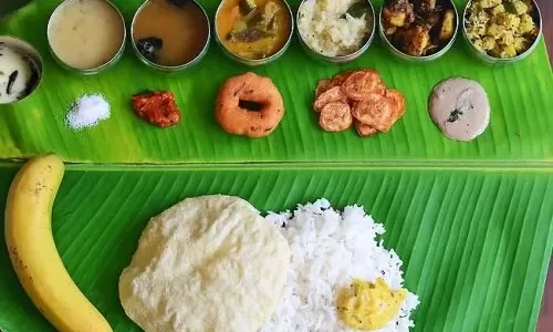 Andhra style engagement catering services in Bangalore serving traditional vegetarian banana leaf meals