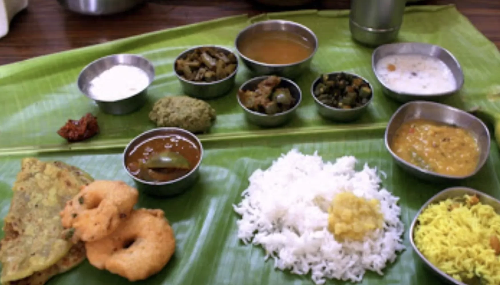 Best Andhra style catering recipe in Bangalore served on a traditional banana leaf with authentic South Indian dishes