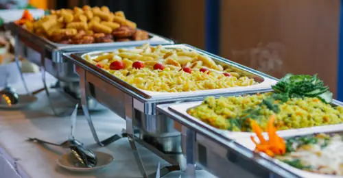 Vegetarian buffet catering setup for events in Bangalore with hot serving counters