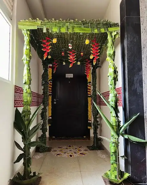 Pandiri flower decoration with banana leaves for apartment housewarming in Bangalore.