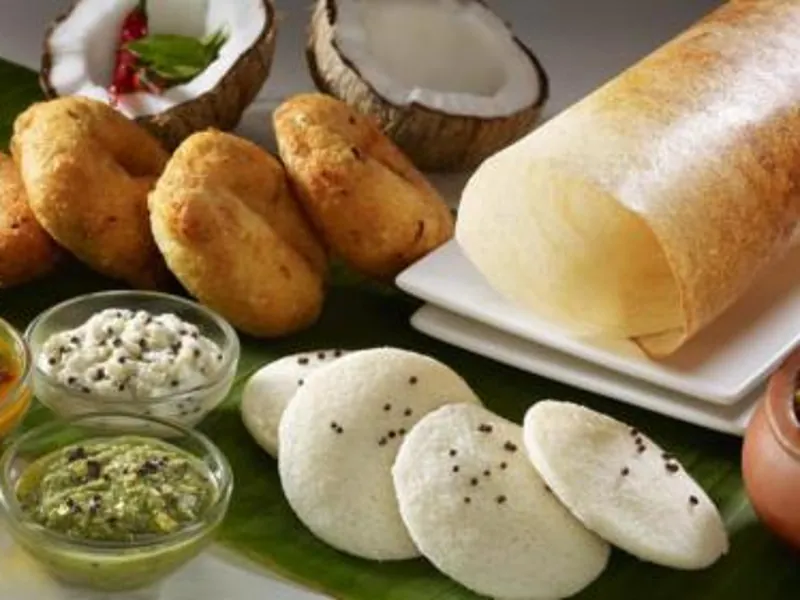 South Indian breakfast catering menu with idli, dosa, vada, chutney and sambar served on banana leaf