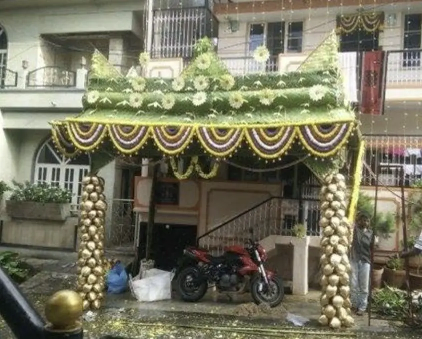 Elegant chappara floral decoration for housewarming function using fresh flowers