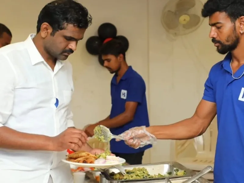 Catering staff serving food to guests at a vegetarian buffet during an event