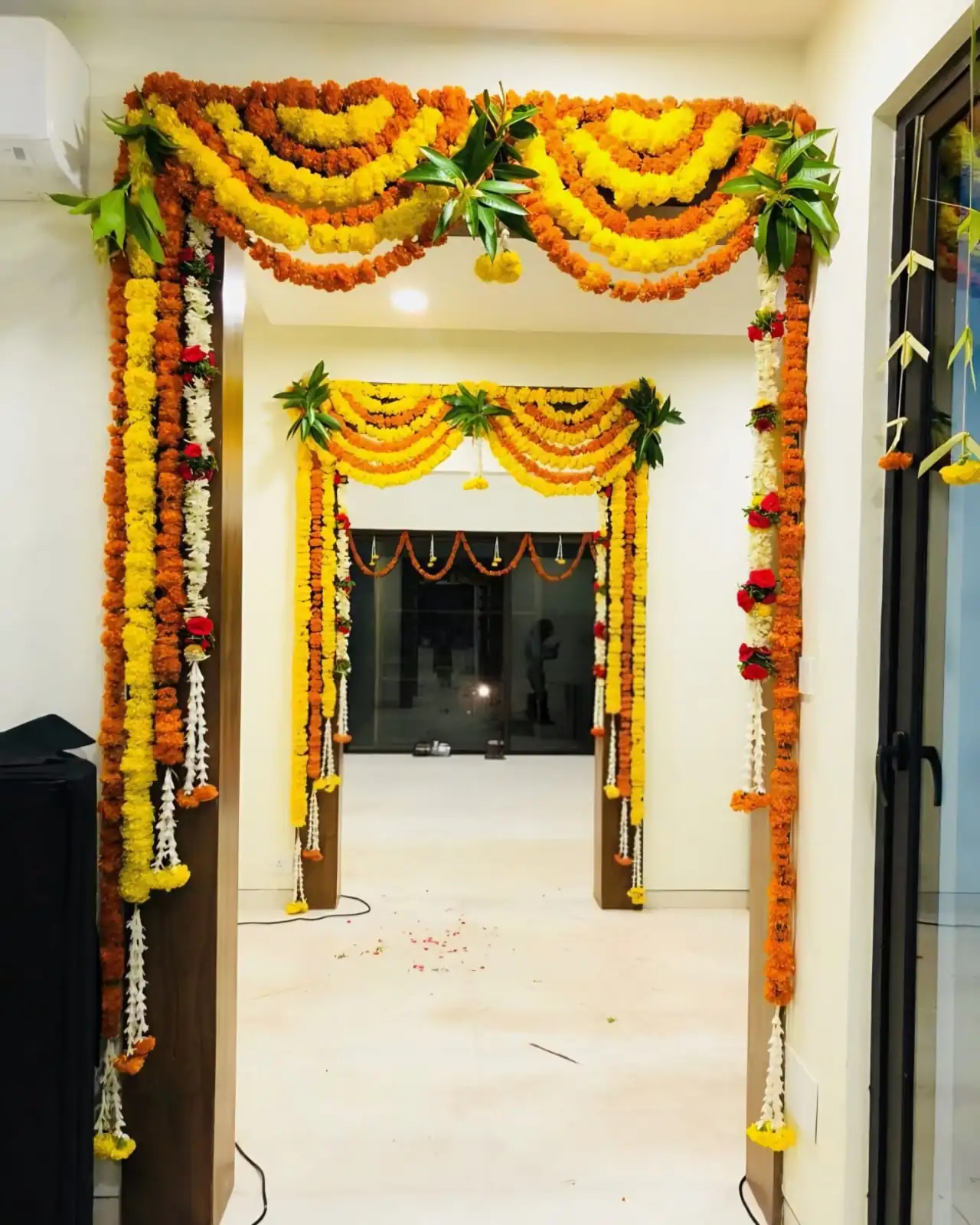 Grand flower decoration for apartment flat griha pravesh ceremony in Bangalore.