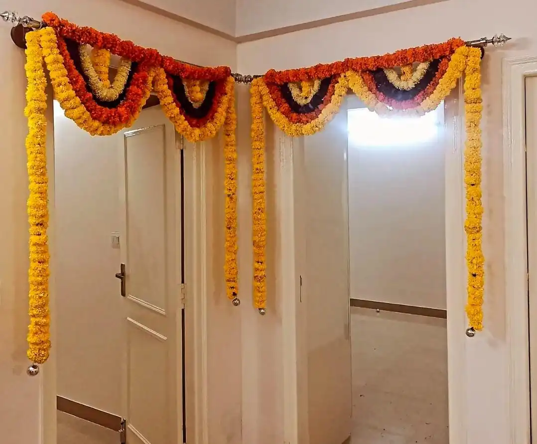 Bedroom door flower arrangements for griha pravesh ceremony in Bangalore