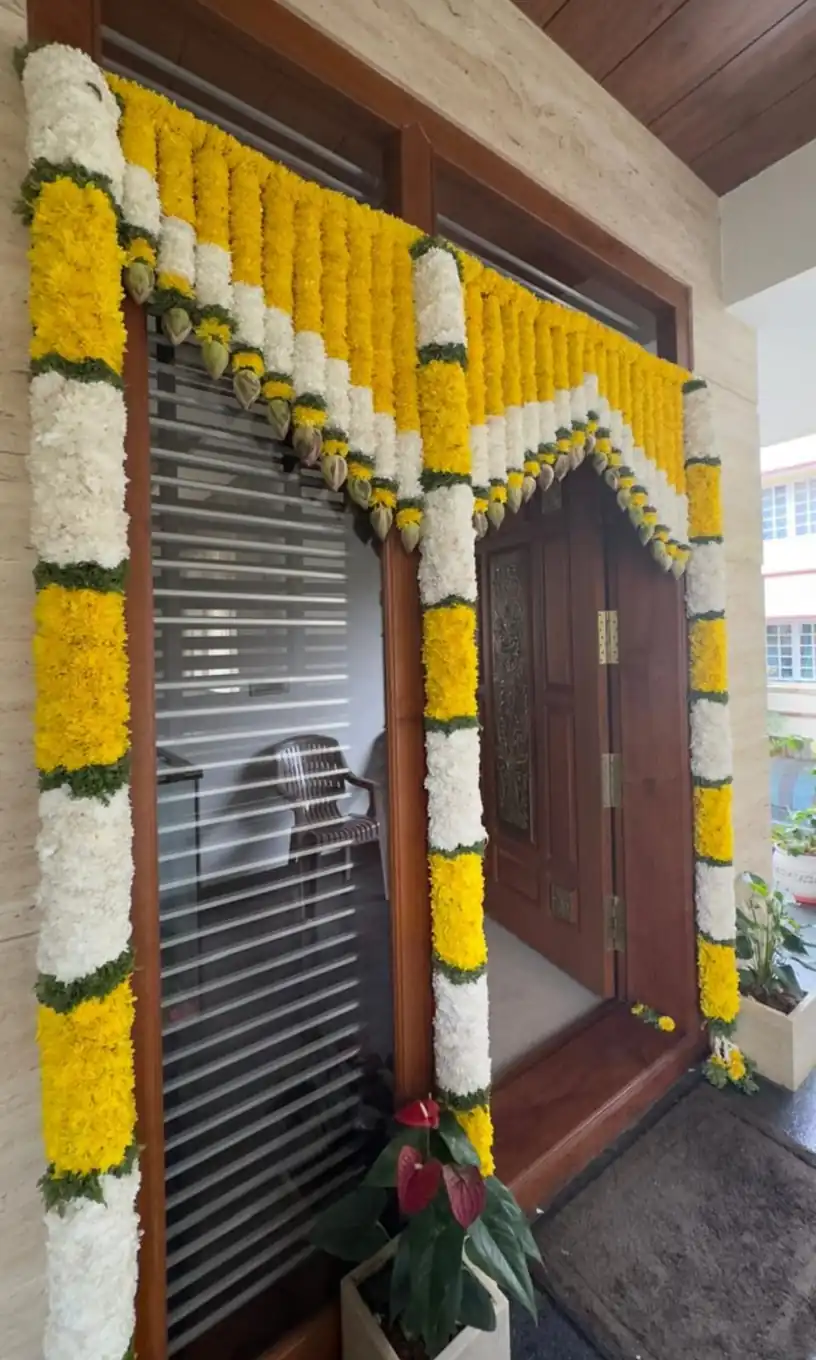 Main door flower garland decoration for griha pravesh ceremony