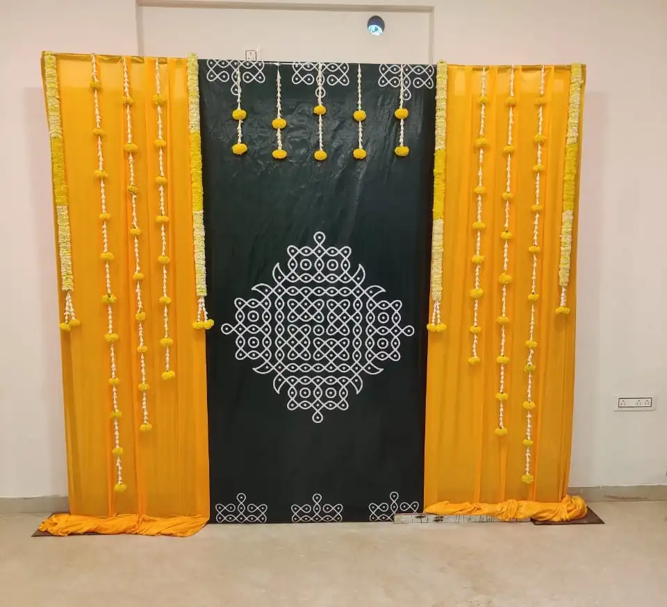 Banana leaf and marigold flower backdrop for gruhapravesham pooja