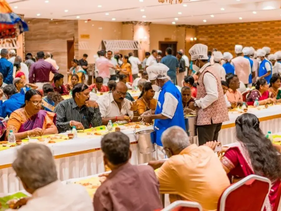 Indoor function catering service in Bangalore with vegetarian food and buffet setup for family and wedding events