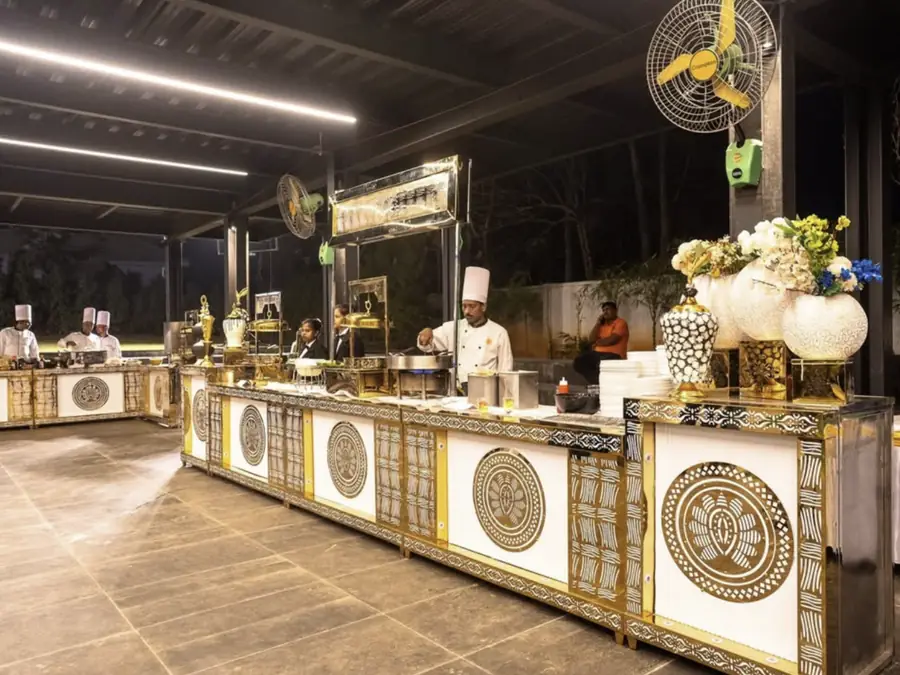 Outdoor event catering service in Bangalore with vegetarian buffet setup for weddings, parties, and functions