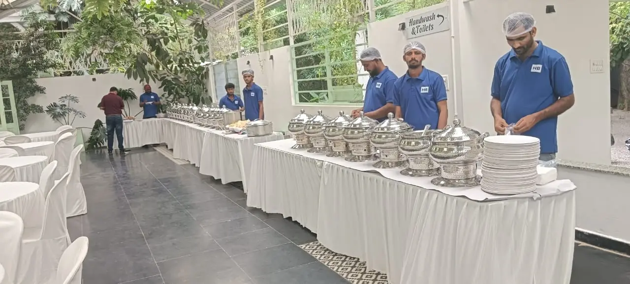 Veg buffet catering service for housewarming ceremony in Bangalore with live service staff.