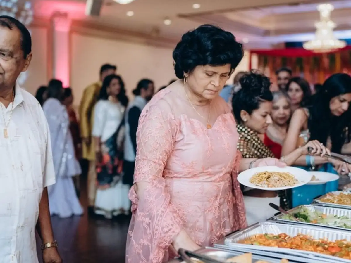 Venue catering setup in Bangalore with vegetarian buffet counters and professional food service arrangement