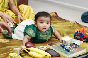 Traditional annaprasana ceremony setup with baby and ritual items arranged for first rice feeding ceremony in Bangalore