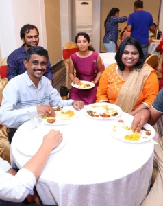 Guests enjoying buffet catering service at an event in Bangalore by Hiibangalore catering team