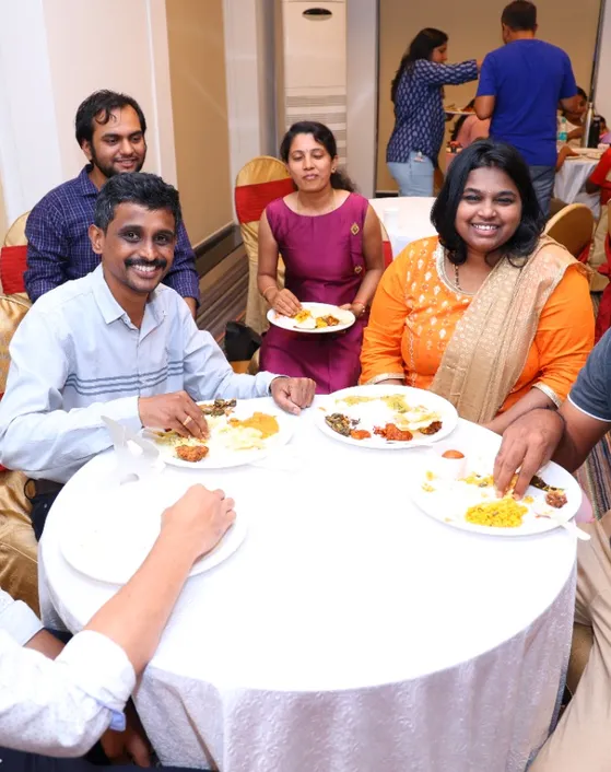 Guests enjoying buffet catering service at an event in Bangalore by Hiibangalore catering team