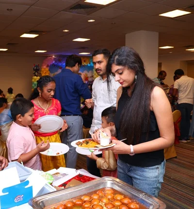 Guests enjoying buffet catering service at a birthday party in Bangalore by Hiibangalore