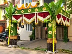Traditional housewarming chappara decoration with banana leaves and flowers in Bangalore