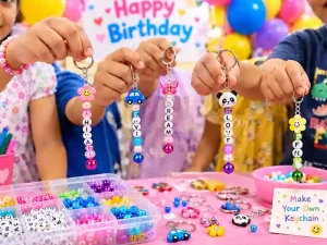 Children making personalized keychains at a naming ceremony activity