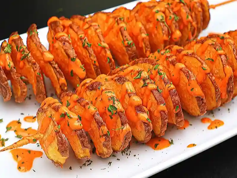 Crispy potato twister snack served at a naming ceremony