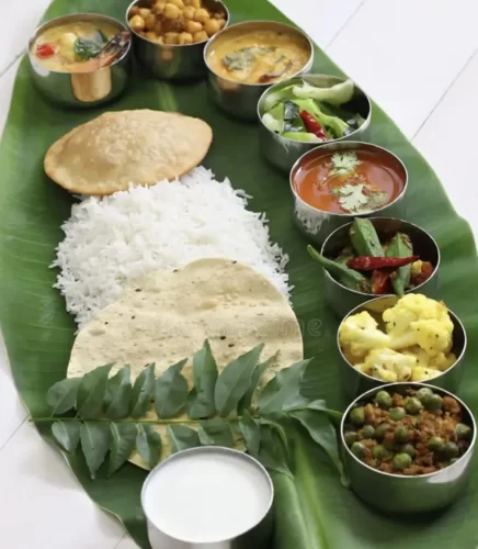Wedding catering setup with banana leaf meals