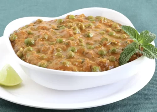 Batani curry prepared in Andhra style for veg catering services in Bangalore