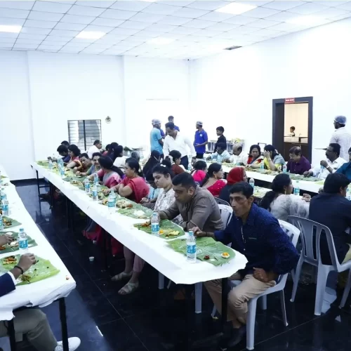 Guests enjoying authentic Andhra meals served on banana leaves in Bangalore