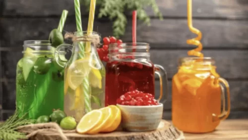 Colorful fruit mocktails served in jars for Andhra style catering Bangalore