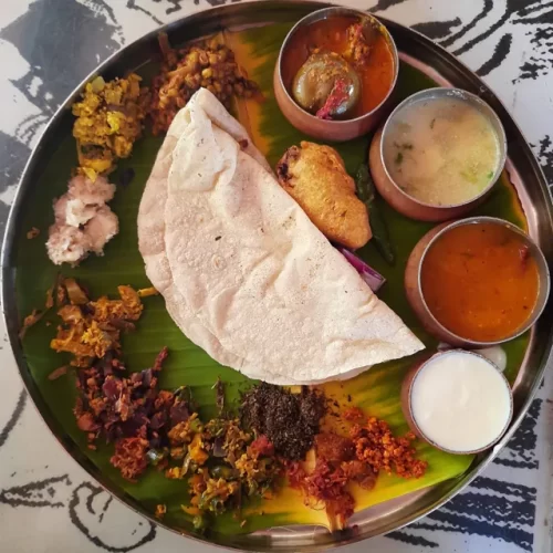 Jonna rotti thali with curries and traditional Andhra side dishes