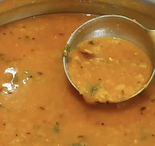 Andhra style pappu charu served in traditional catering setup in Bangalore