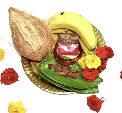thambulam plate with coconut, banana, betel leaves and bangles