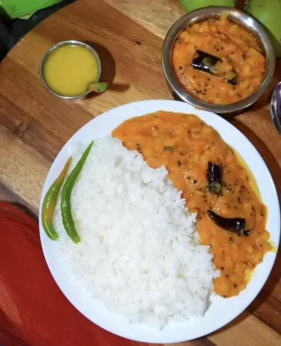 Tomato pappu annam with ghee served in Andhra catering style
