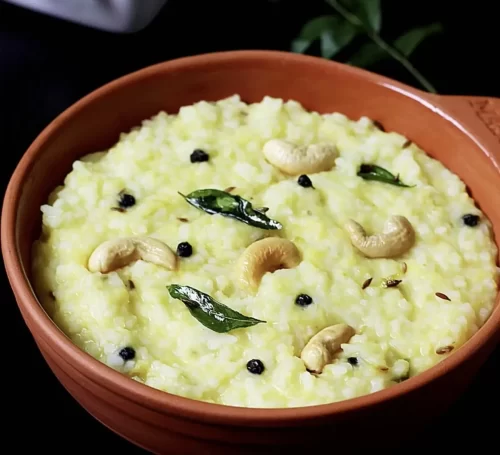 Andhra style ven pongal prepared with ghee and cashews for catering services in Bangalore